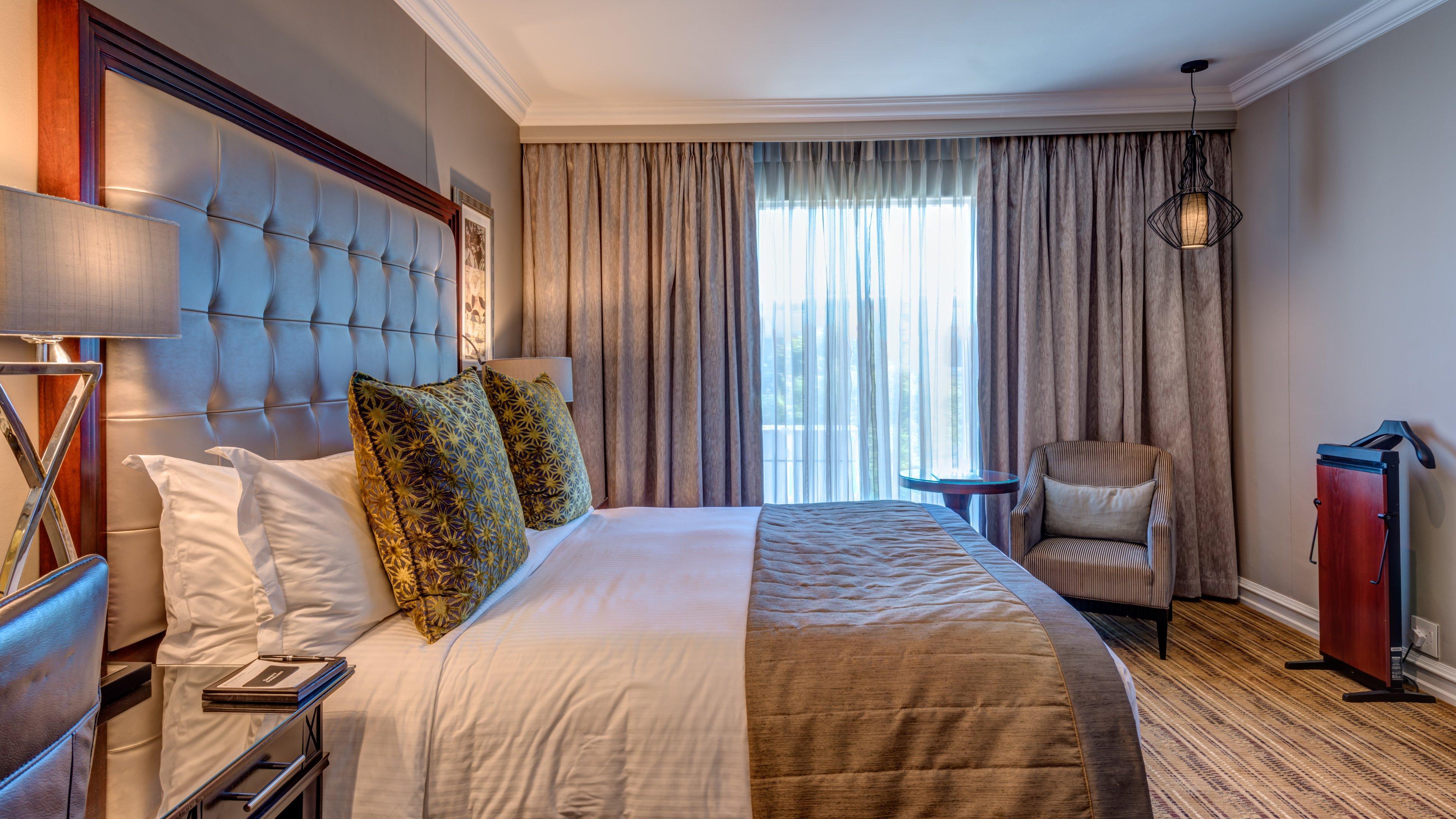 Intercontinental Johannesburg Or Tambo Airport Hotel By Ihg Kempton Park Dış mekan fotoğraf A bedroom at the hotel